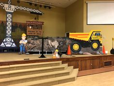 a construction themed stage set up for a children's birthday party