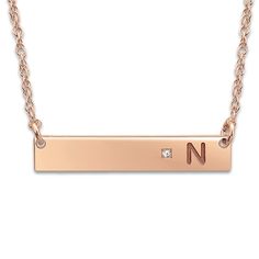 Create a meaningful gift or a cherished keepsake and inscribe your favorite initial onto this sleek women's bar pendant necklace, punctuated with a brilliant diamond accent. Fashioned in 14K rose gold, the 18-inch rope chain secures in place with a spring ring clasp. Free personalization! Please provide one initial for this item if you wish to personalize it. Minimalist Bar Necklace With Diamond Accents For Gift, Pendant Necklace Diamond, Jewelry Bar, Diamond Bar Necklace, Bar Pendant Necklace, Jared The Galleria Of Jewelry, Necklace Diamond, Bar Pendant, Diamond Pendant Necklace