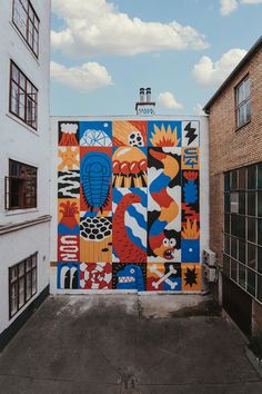 a large mural on the side of a building