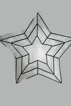 a white and black star on a gray background