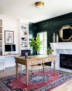 a living room filled with furniture and a fire place