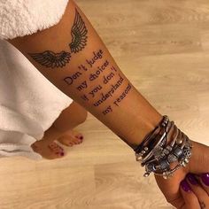 a woman's arm with a tattoo that says don't judge my body