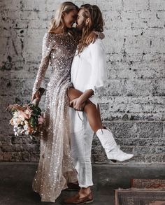 two women in white boots are standing next to each other