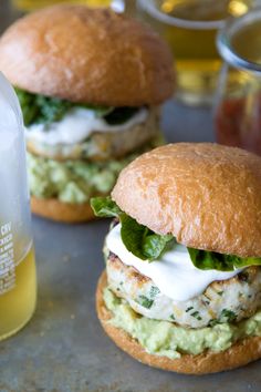 two chicken burgers with guacamole and mayonnaise