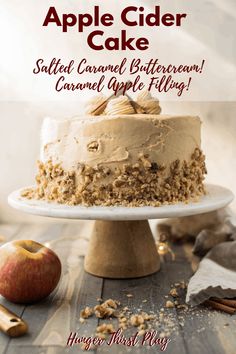 an apple cider cake is sitting on a table