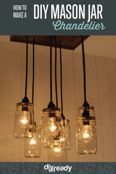 mason jar chandelier with lights hanging from the ceiling