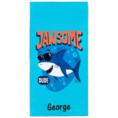 a blue towel with an image of a shark and the words jawssome on it