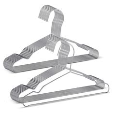 a pair of clothes hangers on a white background with clippings to the bottom