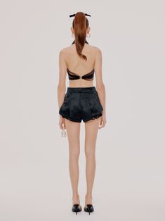 Give your weekend wardrobe a fierce update with these shorts. Featuring a black material with pleat detailing and a turn-up hem design. Style with a statement top, gold accessories and on oversized blazer for brunch with the ladies! Pleat Detail Mesh Detail SIZE & FIT Model is wearing a size M Model is 5'8 & 110 lbs FABRIC Side A: 62.7% cotton 37.3% mulberry silk Side B: 100% nylon (except sequins) Lining A: 100% polyester Lining B: 100% nylon Chic Fitted Evening Shorts, Elegant Fitted Evening Shorts, Chic High-waisted Shorts For Evening, Elegant Shorts For Night Out, Elegant High-waisted Shorts For Evening, Black Summer Evening Shorts, Elegant High-waisted Shorts For Party, Elegant Party Bottoms With Built-in Shorts, Luxury Bottoms For Night Out