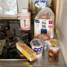 various ingredients are sitting on top of the stove