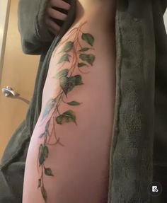 a person with a tattoo on their arm