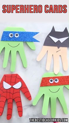 three handprinted superhero cards with eyes and hands