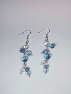 These are dangly earrings that give off bubble or rain vibes. They made me think of the anime movie Weathering With You. These would go well with a lot of outfits that need a little pop! Rain Vibes, Rain Earrings, With You, Summer Rain, Of Outfits, Dangly Earrings, Anime Movies, Jewelry Earrings Dangle, Etsy Earrings