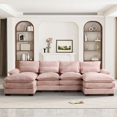 a living room with a large pink couch