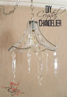 a chandelier hanging from a ceiling with the words diy crystal chandelier above it