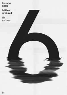 the number six is in black and white with water on it's surface,