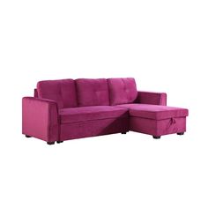 a purple couch and ottoman sitting next to each other