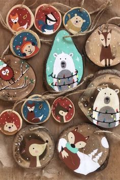 wooden ornaments with animals and trees on them