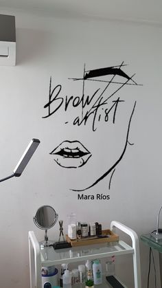 there is a wall with the words brown artist on it