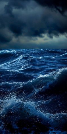 the ocean is very dark and stormy at night