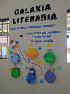 there is a sign that says galaaxia litereraria in spanish and english