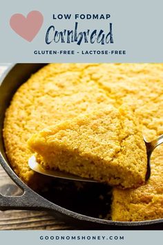 a piece of cornbread in a skillet with a spoon on it and the text overlay reads low fodmap cornbread gluen free lactose - lactose - free