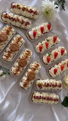 there are many desserts on the table ready to be cut into pieces and served