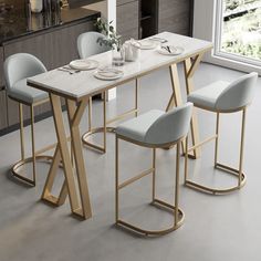 a dining table with four chairs around it