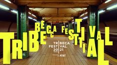 a subway station with the words beca de tivela tribe festival in yellow