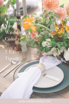 an image of a table setting with flowers and napkins on the place settings for a wedding