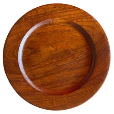 an empty wooden plate on a white background