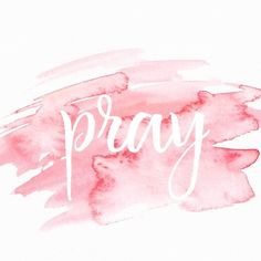 the word pray painted in pink watercolor