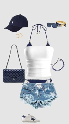 a white tank top, denim shorts and sneakers