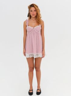 Crafted in a fuzzy gingham dot fabric—reminiscent of vintage tablecloths—the Melanie pink mini dress has laid-back summer appeal. Featuring ruched underwire cups trimmed in lace, this babydoll dress is finished with a lace bow at the center-front gore and a wide lace trim along the skirt opening. Mini Dress Pink, Pink Mini Dress, Dot Fabric, Vintage Tablecloths, Lace Bows, Dotted Fabric, Little White Dresses, Pink Mini, Pink Mini Dresses