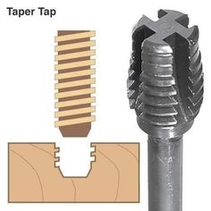 an image of a drill bit being used to cut wood