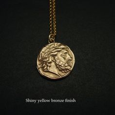 Handmade Zeus pendant by reproducing an ancient Greek coin of Zeus or Jupiter in Latin.The original coin was minted by Philip II (father of Alexander the Great) in Pella, Macedonia between 359 and 336 BC.It represents Zeus, king of the Gods. God of the sky, lightning, thunder, law, order, justice.The quality of Zeus’ particularly elegant portrait on this coin, with a smooth forehead, clean arch of the eyebrow, and finely chiseled nose shows its inspiration by the gold and ivory statue of Zeus by Smooth Forehead, Percy Jackson Necklace, Statue Of Zeus, Elegant Portrait, Lightning Thunder, Ancient Greek Coin, Greek Coins, Roman Coins, Cameo Jewelry