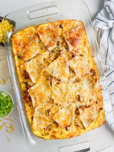 a casserole dish with cheese and meat on it