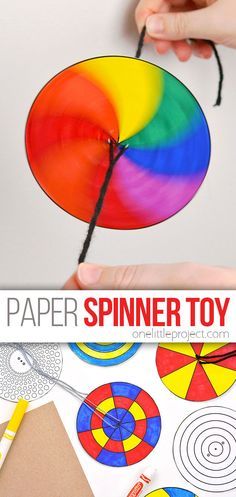 someone is making a paper spinning toy out of construction paper