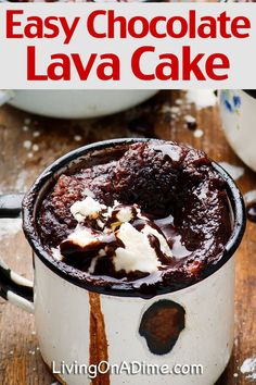 chocolate lava cake in a white mug on a wooden table with text overlay that reads easy chocolate lava cake