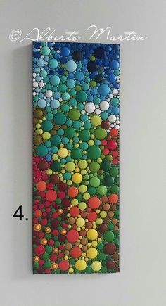 an image of a painting on the wall with numbers and colors in it, including circles