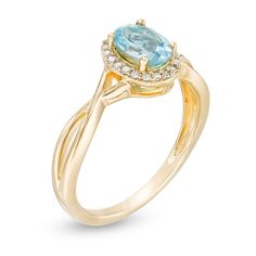 Marvel her with the details of this gorgeous gemstone and diamond ring. Crafted in warm 10K gold, this stunning style showcases a 7.0 x 5.0mm oval-shaped Swiss blue topaz wrapped in a shimmering diamond-lined halo. An open twist shank completes the look. Radiant with 1/15 ct. t.w. of diamonds and a brilliant buffed luster, this ring is certain to be treasured. Stunning Style, Diamond Frame, Peoples Jewellers, Blue Topaz Stone, Swiss Blue Topaz, Topaz Stone, Oval Stone, Diamond Stone, 10k Gold