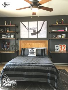 a bed room with a neatly made bed and two shelves on the wall above it