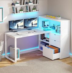 a white desk with two computer monitors on top of it and a shelf filled with books