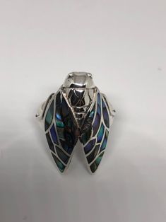 Vintage Deco Abalone Ring Cicada 925 sterling silver Lovely polished sterling silver has the look of Deco with a huge abalone inlaid cicada motif very detailed vintage Size 8 We can size these with an additional $10-$20 fee for the jeweler All rings are shipped free in the US in a nice gift box. Check out our over a THOUSAND great reviews Engraving is $4 per letter and is not always perfect depending on the piece. It can take a few days if the jeweler is busy. This is payable to Paypal Judithslt Abalone Ring, Eternal Life, Statement Rings, Cufflinks, Rings For Men, Best Gifts, Gift Box, Sport Shoes, Take That