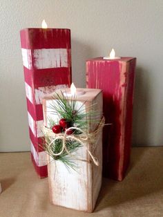 two wooden blocks decorated with christmas decorations