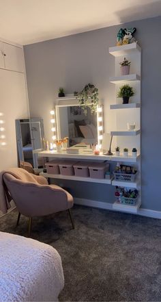 a bedroom with a chair, mirror and shelves on the wall next to a bed