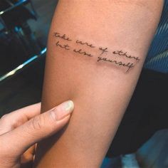 a woman's arm with a tattoo that says, take me to the other side and