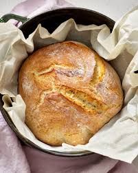 a loaf of bread sitting in a basket