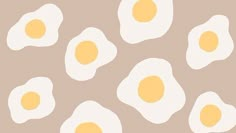 an image of eggs in the shape of hearts on a light brown and white background