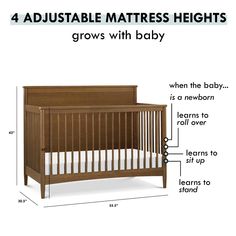 an image of a baby crib with measurements